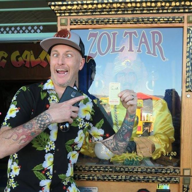 Chris with Zoltar fortune teller machine